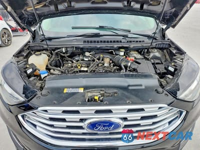 Zdjęcie 12 z 12 samochodu: 2021 FORD EDGE SEL VIN:2FMPK3J96MBA26397 - miniatura