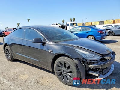 Czwarte zdjęcie samochodu z boku: 2019 TESLA MODEL 3 VIN:5YJ3E1EA9KF396049 - miniatura