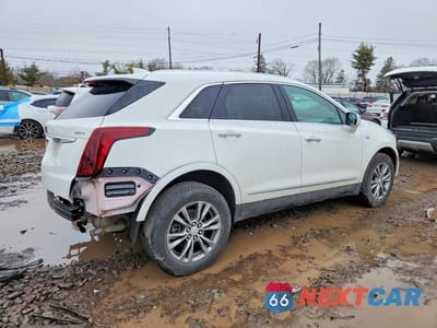 Trzecie zdjęcie samochodu z tyłu: 2021 CADILLAC XT5 PREMIUM LUXURY VIN:1GYKNCR44MZ153980 - miniatura
