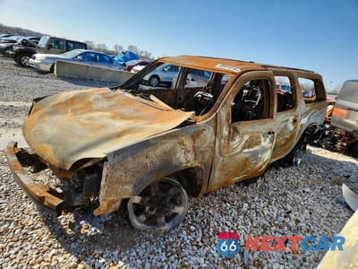 2010 GMC YUKON XL C1500 SLT 1GKUCKE05AR216991 - główne zdjęcie licytacji z USA - miniatura