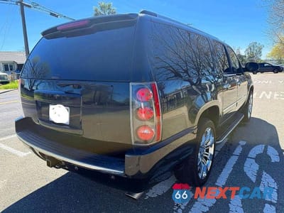 Czwarte zdjęcie samochodu z boku: 2012 GMC YUKON XL DENALI VIN:1GKS2MEF7CR156502 - miniatura