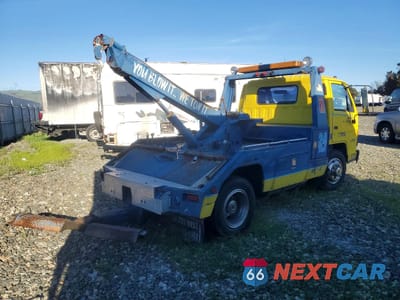 Trzecie zdjęcie samochodu z tyłu: 1990 ISUZU NPR TOW TRUCK VIN:JALB4B1H3L7000999 - miniatura