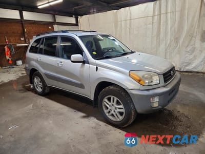 Czwarte zdjęcie samochodu z boku: 2001 TOYOTA RAV4 BASE VIN:JTEGH20V610010043 - miniatura