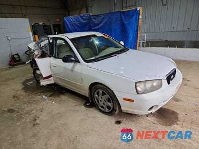 Czwarte zdjęcie samochodu z boku: 2003 HYUNDAI ELANTRA GLS VIN:KMHDN45D13U514969 - miniatura