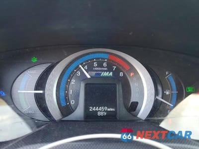 Zdjęcie 9 z 11 samochodu: 2010 HONDA INSIGHT EX VIN:JHMZE2H70AS008559 - miniatura