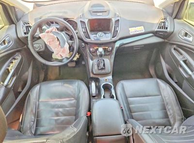 Zdjęcie 8 z 12 samochodu: 2014 FORD ESCAPE TITANIUM VIN:1FMCU0J95EUE56778 - miniatura