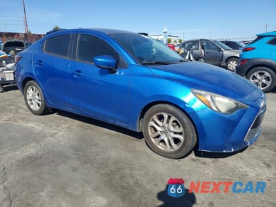 Czwarte zdjęcie samochodu z boku: 2016 SCION IA BASE VIN:3MYDLBZV1GY129126 - miniatura