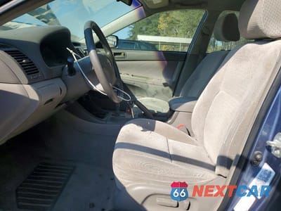 Zdjęcie 7 z 11 samochodu: 2003 TOYOTA CAMRY LE VIN:4T1BE32K43U661890 - miniatura