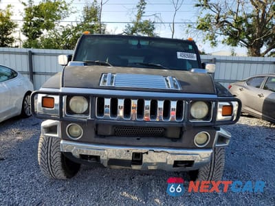 Piąte zdjęcie samochodu w środku: 2005 HUMMER H2 VIN:5GRGN23U95H102074 - miniatura