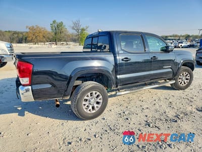 Trzecie zdjęcie samochodu z tyłu: 2017 TOYOTA TACOMA SR5 VIN:5TFAX5GN7HX074453 - miniatura