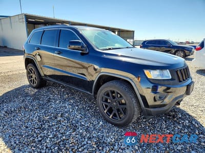 Czwarte zdjęcie samochodu z boku: 2015 JEEP GRAND CHEROKEE LAREDO VIN:1C4RJFAG4FC790607 - miniatura