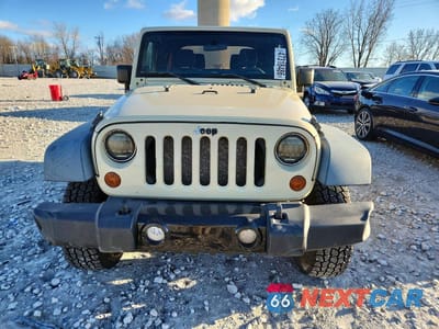 Piąte zdjęcie samochodu w środku: 2011 JEEP WRANGLER SPORT VIN:1J4AA2D11BL620366 - miniatura
