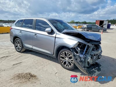 Czwarte zdjęcie samochodu z boku: 2016 MITSUBISHI OUTLANDER SE VIN:JA4AD3A36GZ049979 - miniatura