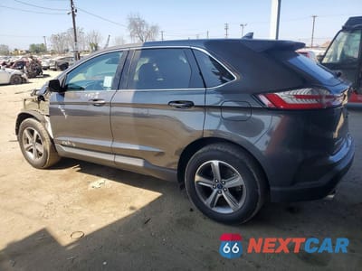 Trzecie zdjęcie samochodu z tyłu: 2020 FORD EDGE SEL VIN:2FMPK3J95LBA59891 - miniatura
