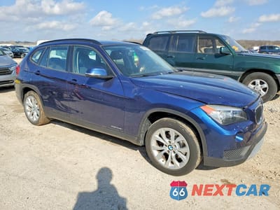 Czwarte zdjęcie samochodu z boku: 2014 BMW X1 XDRIVE28I VIN:WBAVL1C57EVY22909 - miniatura