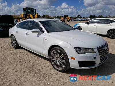 Czwarte zdjęcie samochodu z boku: 2014 AUDI A7 PREMIUM PLUS VIN:WAUWGAFC1EN030242 - miniatura