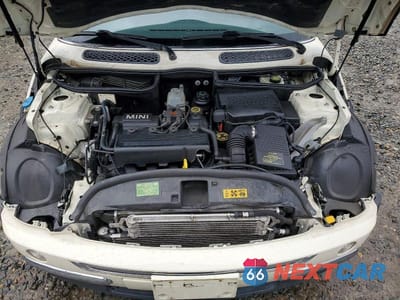 Zdjęcie 11 z 11 samochodu: 2003 MINI COOPER VIN:WMWRC33413TE18200 - miniatura