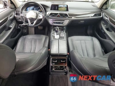 Zdjęcie 8 z 13 samochodu: 2016 BMW 740 I VIN:WBA7E2C50GG504663 - miniatura