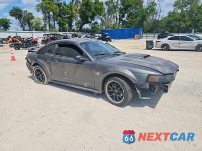 Czwarte zdjęcie samochodu z boku: 2004 FORD MUSTANG GT VIN:1FAFP42X14F131308 - miniatura