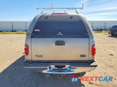Zdjęcie 6 z 12 samochodu: 2001 FORD F-150 VIN:1FTRW07L81KA90283 - miniatura