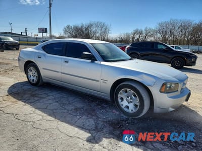 Czwarte zdjęcie samochodu z boku: 2006 DODGE CHARGER SE VIN:2B3KA43G36H528207 - miniatura