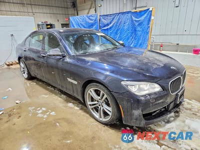 Czwarte zdjęcie samochodu z boku: 2015 BMW 750 LXI VIN:WBAYF8C50FD654860 - miniatura