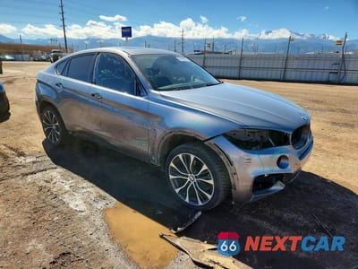 Czwarte zdjęcie samochodu z boku: 2018 BMW X6 XDRIVE35I VIN:5UXKU2C50J0Z62590 - miniatura