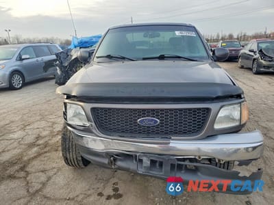 Piąte zdjęcie samochodu w środku: 2002 FORD F150 VIN:2FTRX17L52CA13413 - miniatura