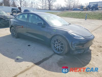 Czwarte zdjęcie samochodu z boku: 2023 TESLA MODEL 3 VIN:5YJ3E1EA1PF459894 - miniatura