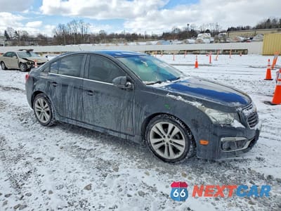 Czwarte zdjęcie samochodu z boku: 2015 CHEVROLET CRUZE LT VIN:1G1PE5SB4F7265282 - miniatura