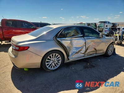 Trzecie zdjęcie samochodu z tyłu: 2017 LINCOLN CONTINENTAL SELECT VIN:1LN6L9SK9H5603012 - miniatura