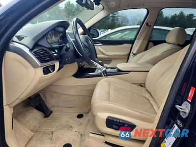 Zdjęcie 7 z 12 samochodu: 2014 BMW X5 XDRIVE35I VIN:5UXKR0C53E0K51669 - miniatura