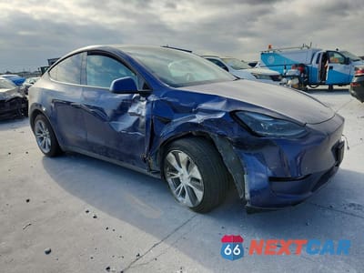 Czwarte zdjęcie samochodu z boku: 2023 TESLA MODEL Y VIN:7SAYGAEE6PF669008 - miniatura