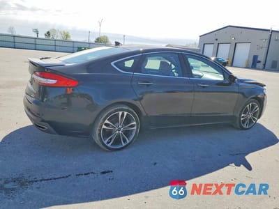 Trzecie zdjęcie samochodu z tyłu: 2020 FORD FUSION TITANIUM VIN:3FA6P0K94LR175105 - miniatura