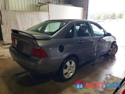 Trzecie zdjęcie samochodu z tyłu: 2007 FORD FOCUS ZX4 VIN:1FAHP34N87W193341 - miniatura