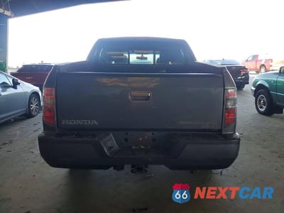 Zdjęcie 6 z 12 samochodu: 2012 HONDA RIDGELINE RTL VIN:5FPYK1F54CB001008 - miniatura