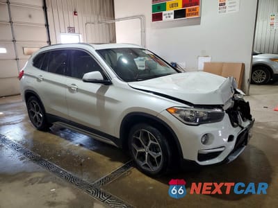 Czwarte zdjęcie samochodu z boku: 2018 BMW X1 XDRIVE28I VIN:WBXHT3C34J3H30064 - miniatura