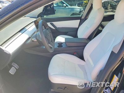 Zdjęcie 7 z 12 samochodu: 2022 TESLA MODEL Y VIN:7SAYGDEF7NF517813 - miniatura