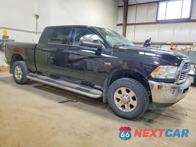 Czwarte zdjęcie samochodu z boku: 2014 RAM TRUCKS 2500 SLT VIN:3C6TR5MT3EG222417 - miniatura