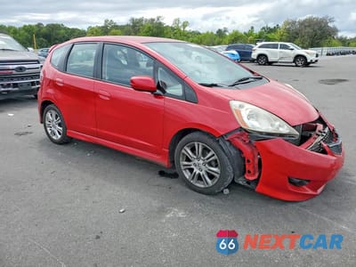 Czwarte zdjęcie samochodu z boku: 2009 HONDA FIT SPORT VIN:JHMGE88489S043801 - miniatura