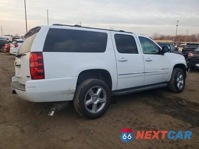 Trzecie zdjęcie samochodu z tyłu: 2012 CHEVROLET SUBURBAN K1500 LTZ VIN:1GNSKKE71CR187552 - miniatura