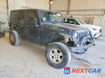 Czwarte zdjęcie samochodu z boku: 2008 JEEP WRANGLER UNLIMITED RUBICON VIN:1J8GA69128L600628 - miniatura