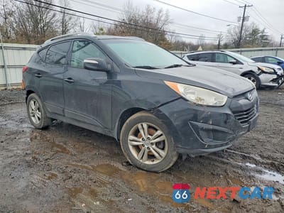 Czwarte zdjęcie samochodu z boku: 2012 HYUNDAI TUCSON GLS VIN:KM8JUCAC8CU393547 - miniatura