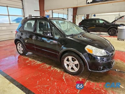 Czwarte zdjęcie samochodu z boku: 2012 SUZUKI SX4 VIN:JS2YB5A32C6307728 - miniatura