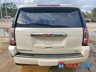 Zdjęcie 6 z 12 samochodu: 2015 GMC YUKON XL DENALI VIN:1GKS1JKJ5FR669973 - miniatura