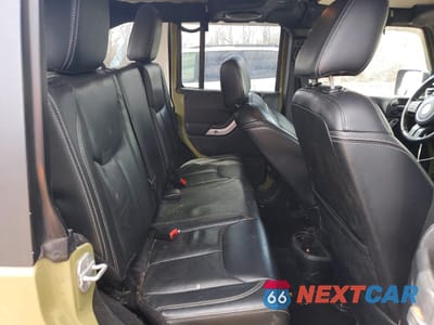 Zdjęcie 11 z 13 samochodu: 2013 JEEP WRANGLER UNLIMITED SAHARA VIN:1C4BJWEG8DL600722 - miniatura