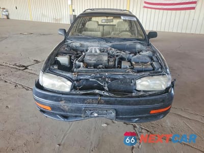 Piąte zdjęcie samochodu w środku: 1994 TOYOTA CAMRY LE V6 VIN:4T1GK12W0RU027815 - miniatura