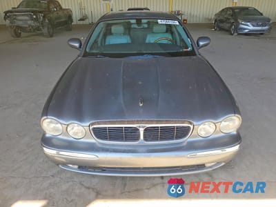 Piąte zdjęcie samochodu w środku: 2004 JAGUAR XJ8 VIN:SAJWA71C04SG25165 - miniatura