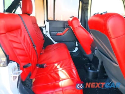 Zdjęcie 10 z 12 samochodu: 2012 JEEP WRANGLER UNLIMITED SAHARA VIN:1C4BJWEG6CL205775 - miniatura