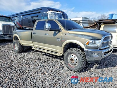 Czwarte zdjęcie samochodu z boku: 2014 RAM 3500 LONGHORN VIN:3C63RRKL3EG165775 - miniatura